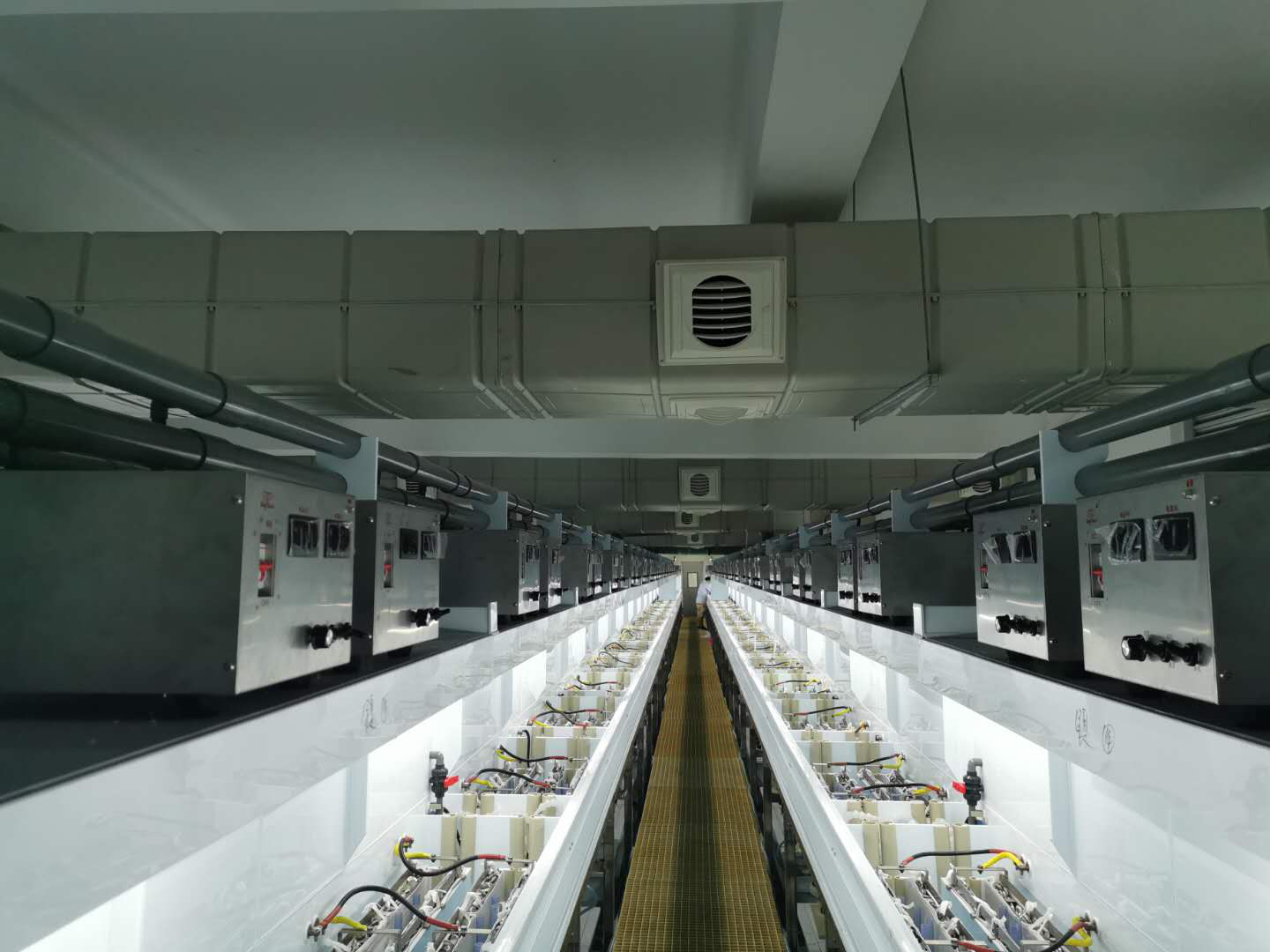 Automated rack-plating production line inside a centralized electroplating park